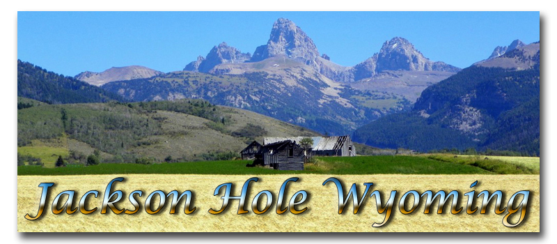 Jackson Hole Wyoming Logo ~ The Grand Tetons or Les Trois Tetons (French for the three breasts) named by trappers. This photograph was taken from the west or Idaho side by Bob Bielski © Copyright All Rights Reserved